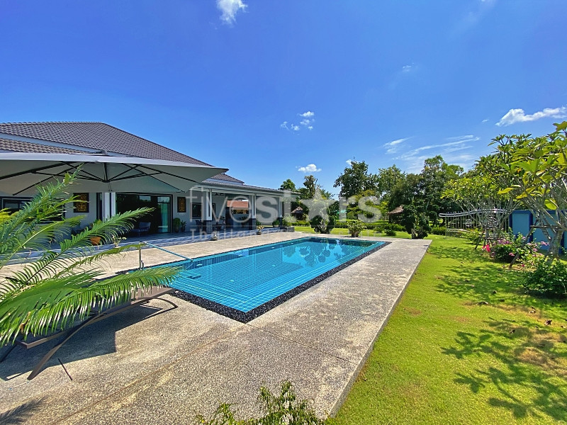 Modern 3-Bedroom Farmhouse with Guesthouse for Sale on 2 Rai in Paknampran