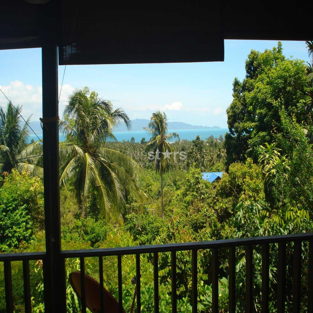 Great sea view land with two villas